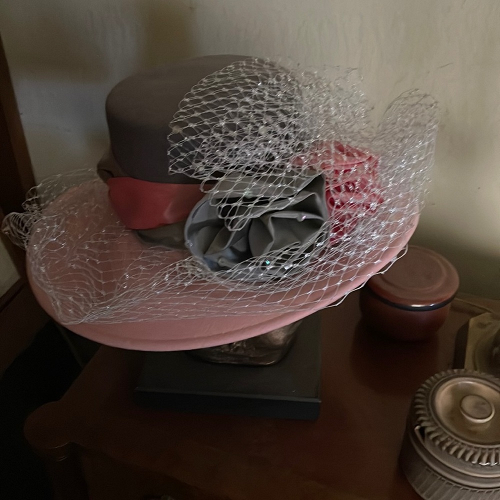 This is a grey and pink hat